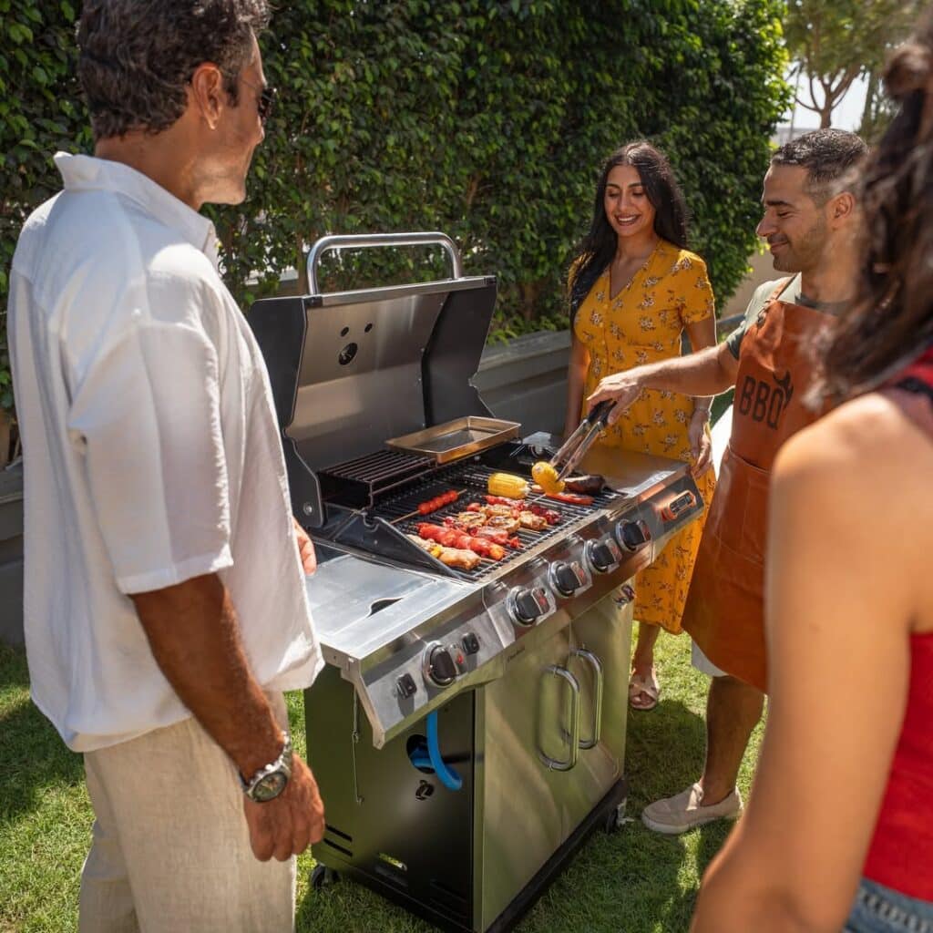 Char-Broil Performance 650 Review: Underrated Gas Grill 2 People Gather Around Char Broil Grill For Cooking And Socializing