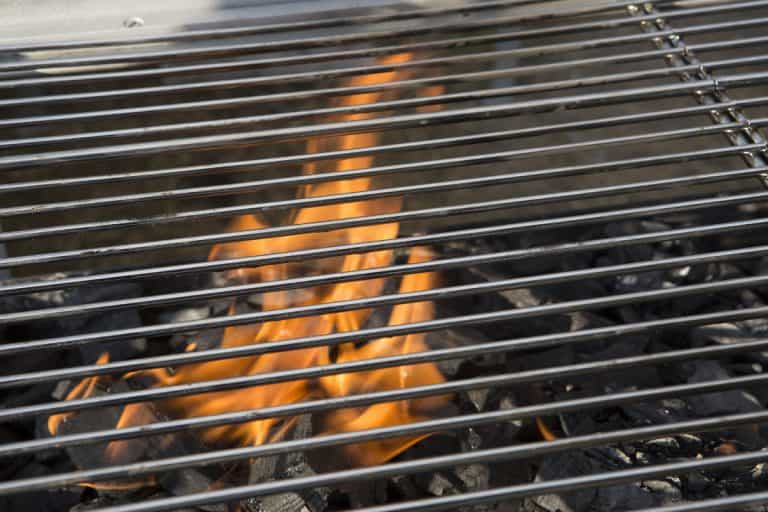 How To Use Wood Pellets in a Charcoal Grill Holy Smoke
