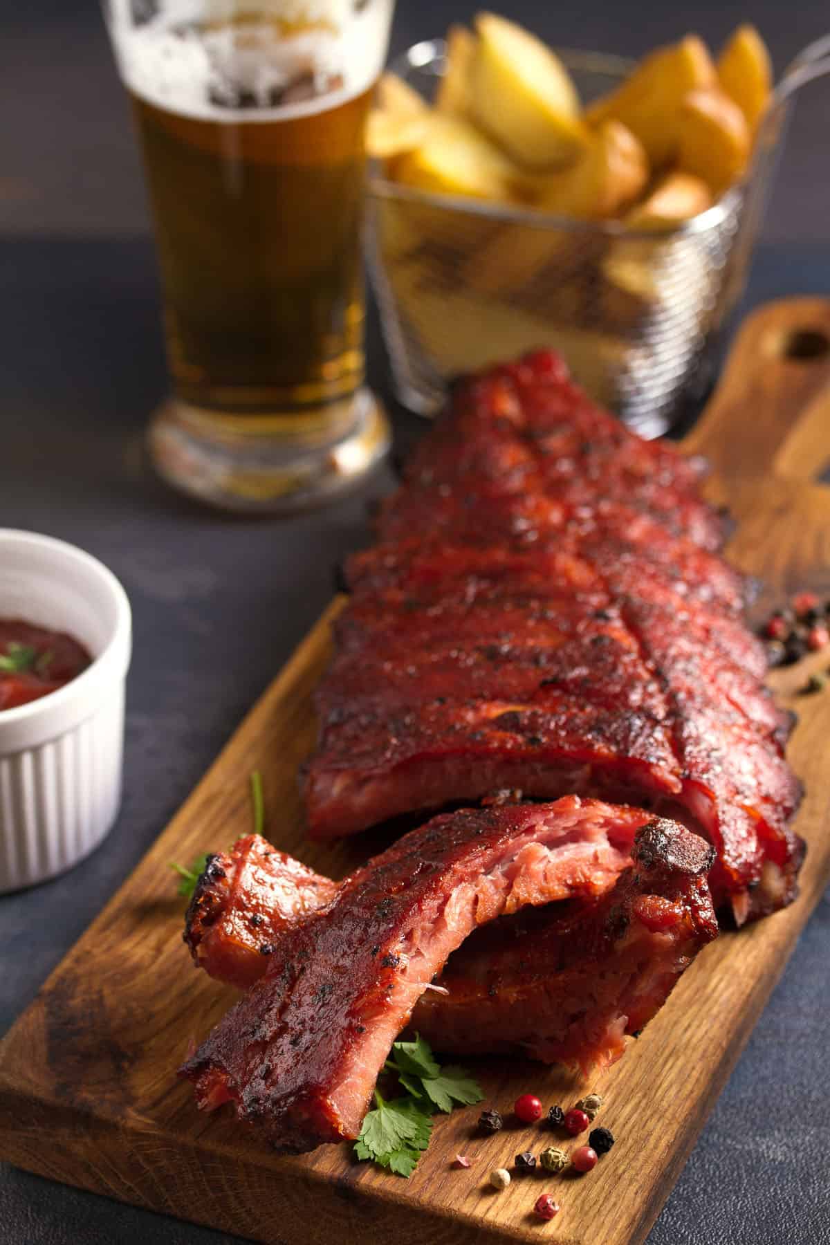 pork loin ribs served on chopping board