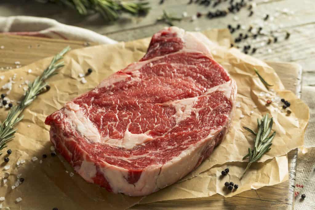 raw grass fed boneless ribeye steak