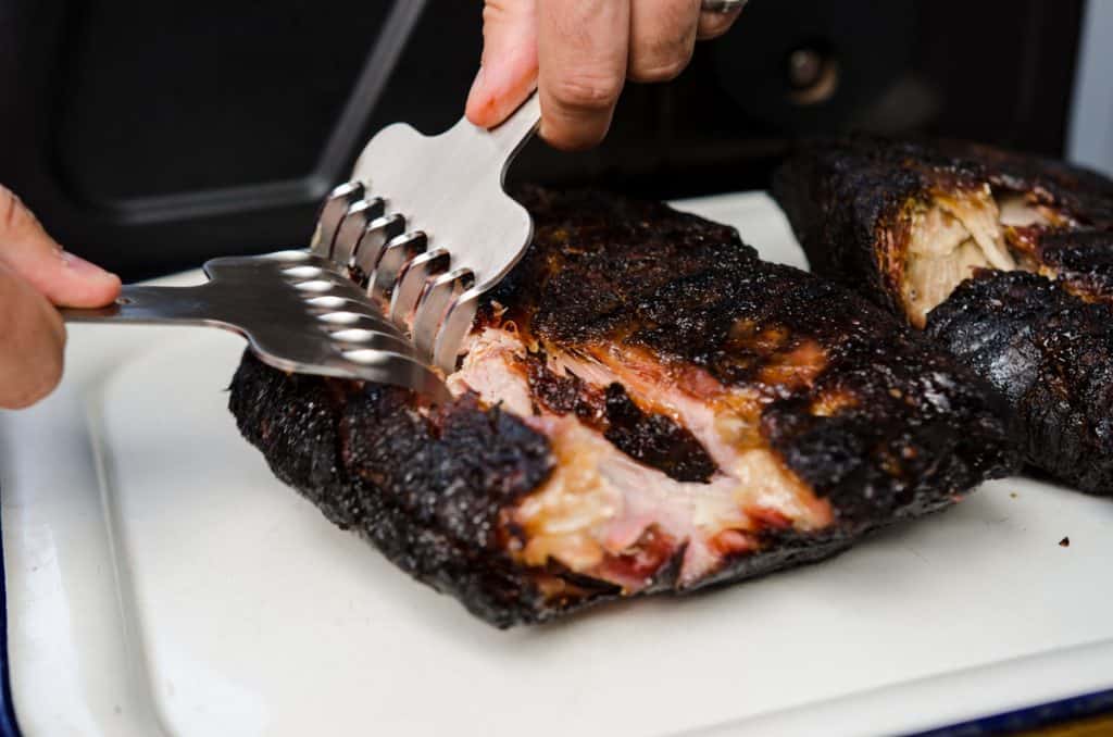 shredding pork meat with special claws