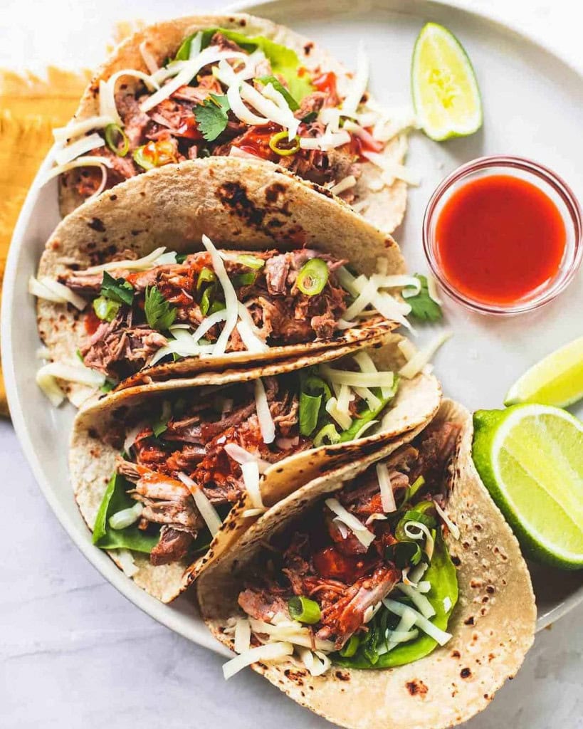 Sweet & Savory Pulled Pork Tacos SlowCooked to Perfection