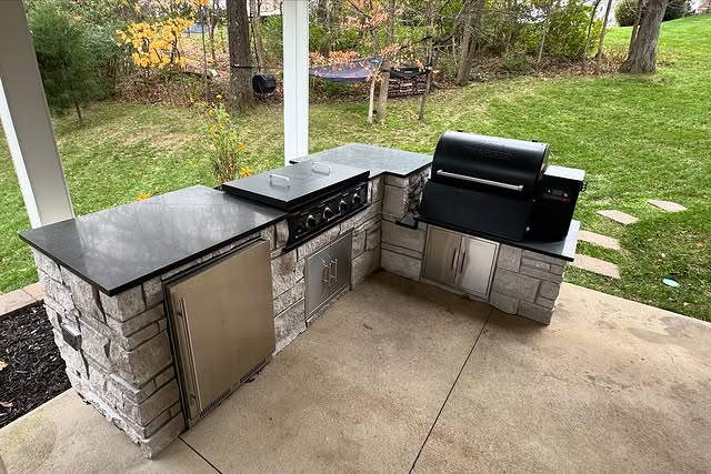 11 Stylish Concrete Outdoor Kitchen Ideas You’ll Want To Copy 5 Built In Concrete Grill Station In Outdoor Kitchen