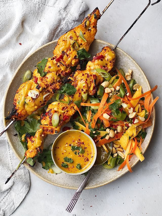 Chicken Satay Skewers With A Mango Lime And Peanut Salad