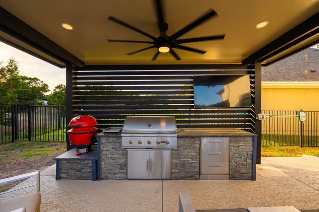 covered brick outdoor kitchen