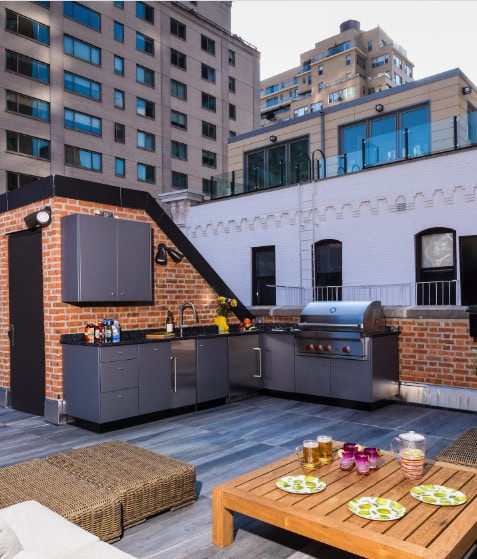 outdoor brick kitchen with modern touches