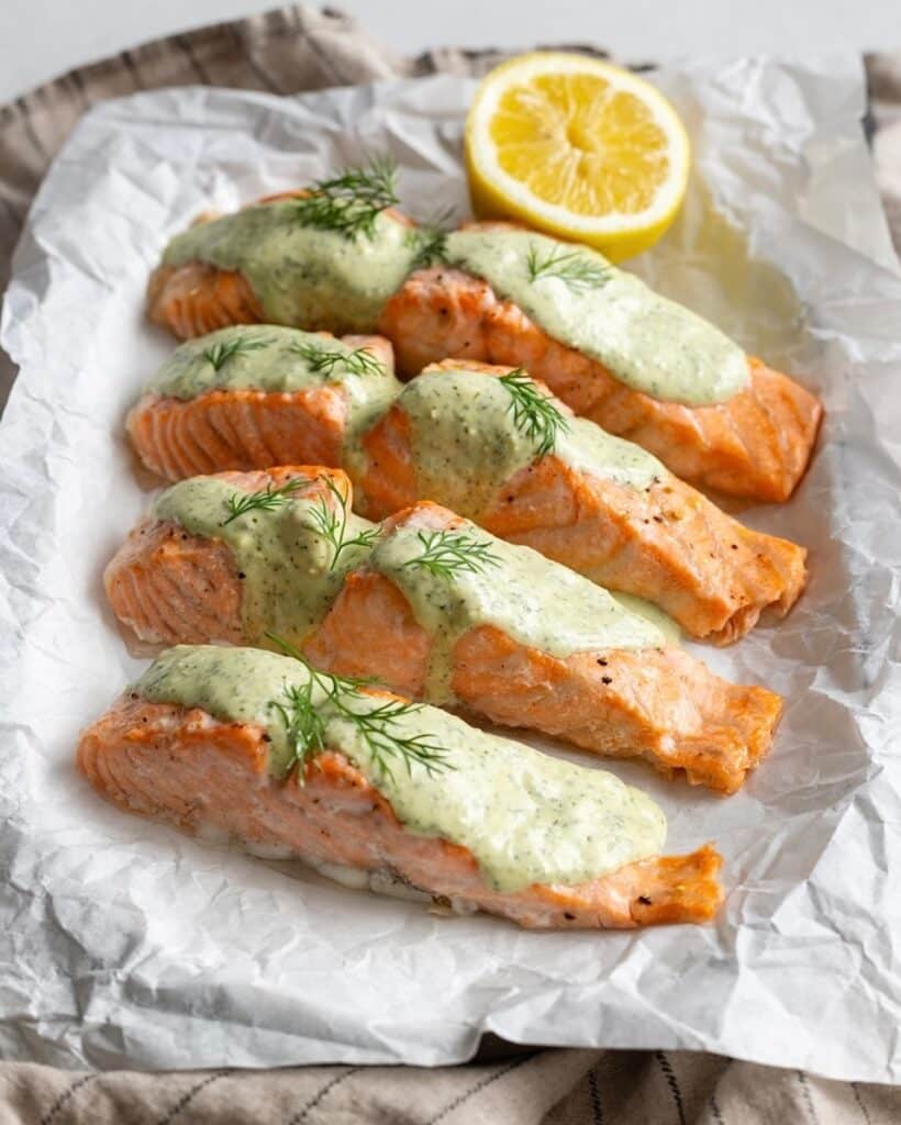 12 No-Fuss Seafood Recipes You’ll Love Cooking For Days On End 2 Crispy Baked Salmon With Lemon Dill Sauce