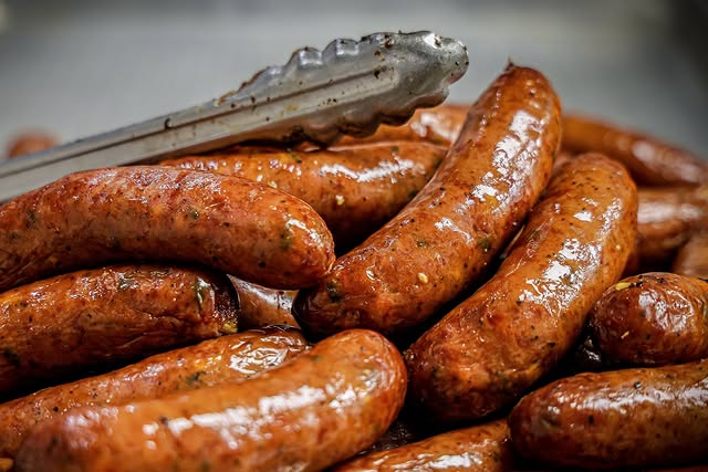 smoked sausage on skillet or grill