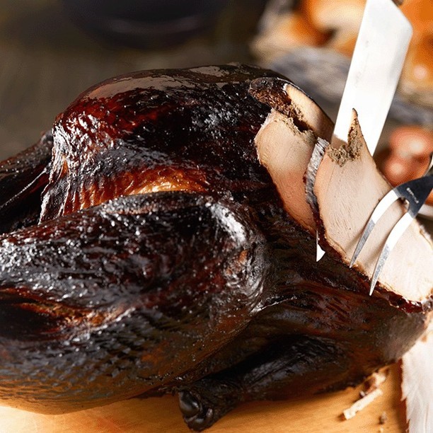 Your Holiday Smoked Turkey Game Plan: From Brine To Carve 3 Smoked Turkey Being Sliced Up
