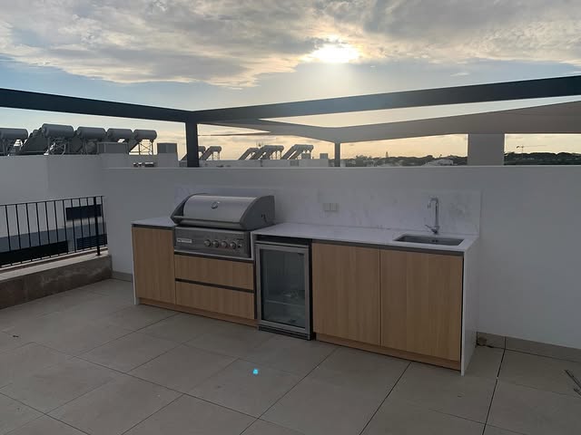 Turn Your Backyard Into A Pizzeria: 17 Outdoor Kitchen With Pizza Oven Ideas 12 The Rooftop Pizzeria