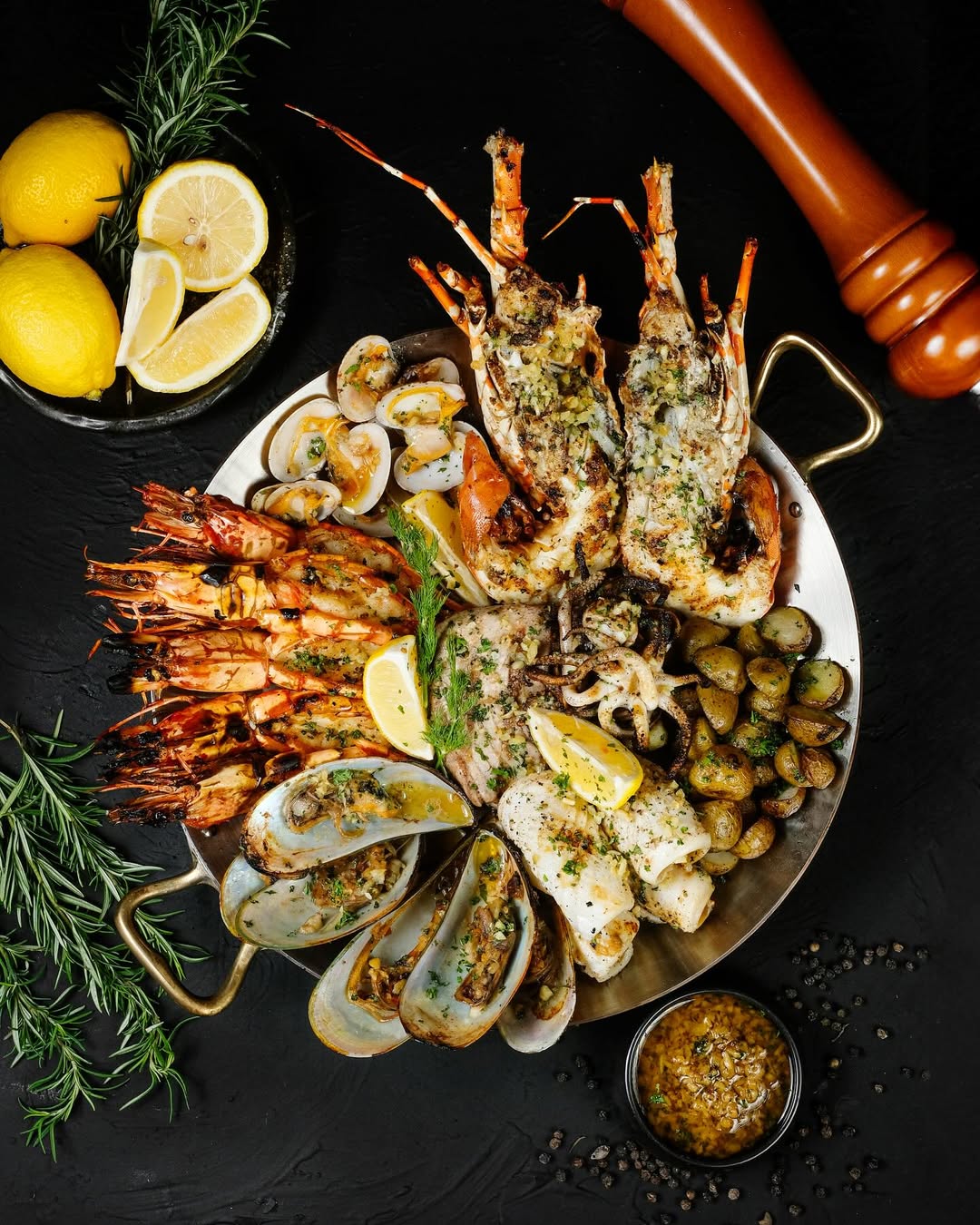 various grilled seafood in a pan