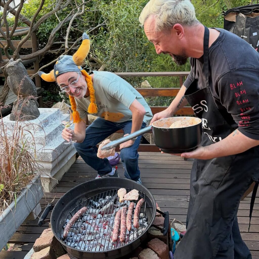 Everything You Need To Know About A South African Braai Bbq: Food, Friends, And Tradition 1 A Couple Of Friends Enjoying South African Braai