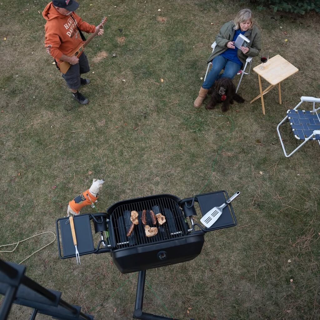 Best Portable Grills For Rv Life And Travel Adventures 8 Family Gathered Near The Rv Grill For Bbq Hangout While Traveling