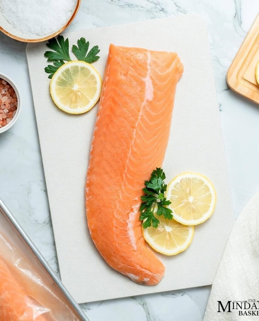 The Secret To Perfectly Grilled Salmon (Crispy Outside, Tender Inside) 1 Fresh Salmon Cut With Herbs And Lemon Slices