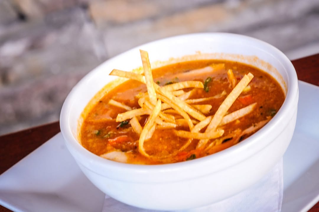 grilled chicken tortilla soup in a bowl