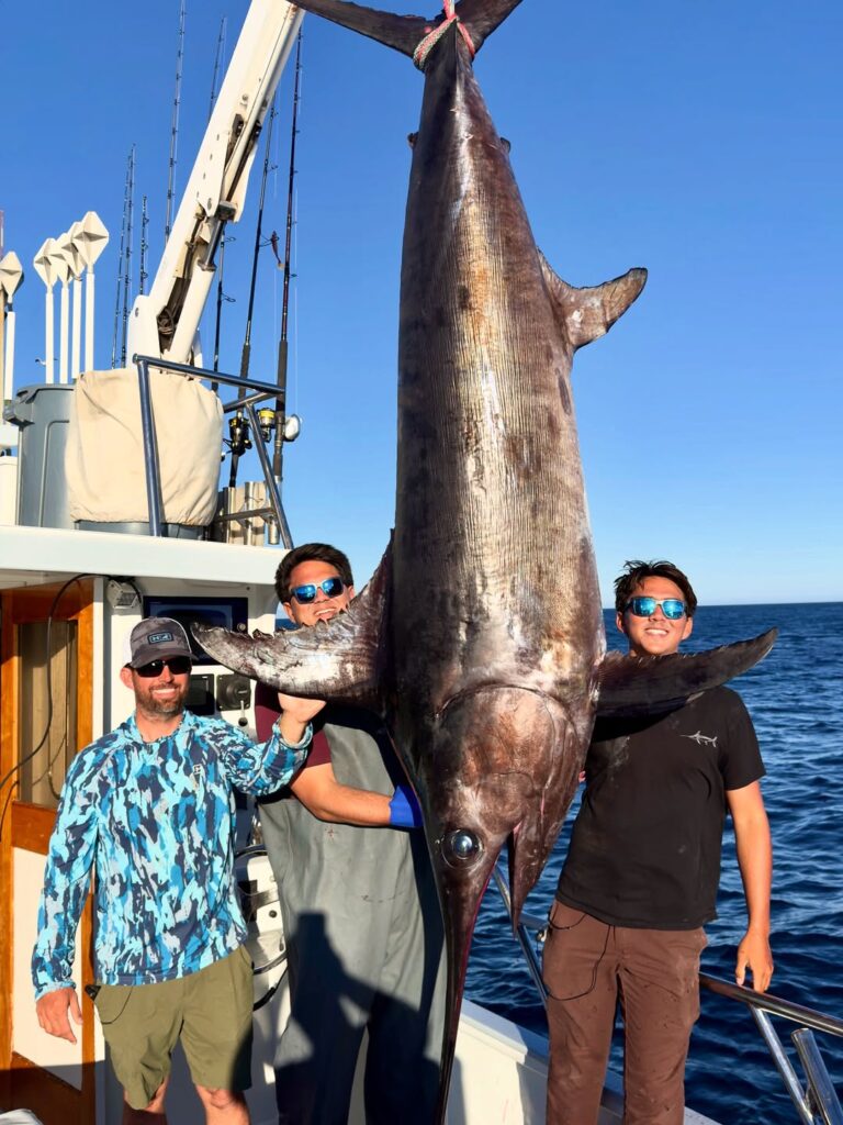 Best Grilled Swordfish Recipe With Fresh Ginger And Lime 1 Men Pose For A Photo With A Huge Catch Of Swordfish