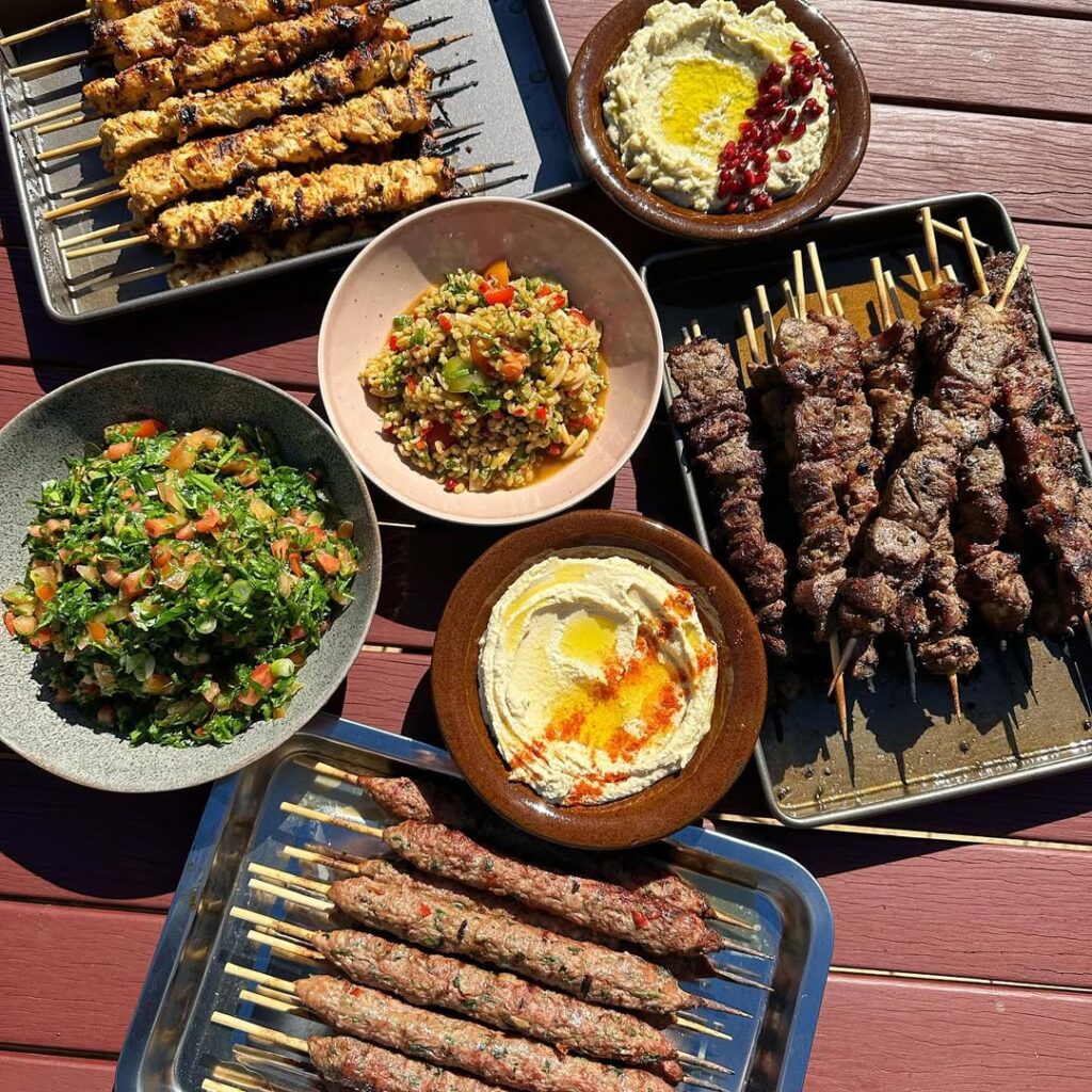 Various Kebabs And Kabobs On The Table