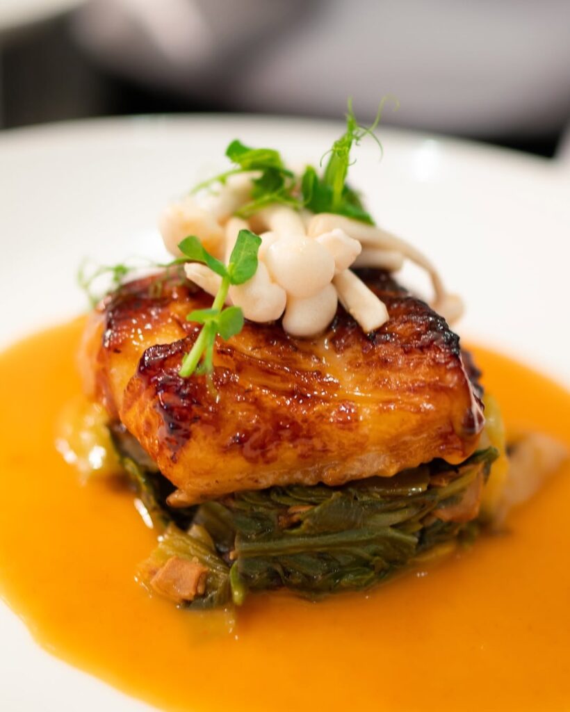 Chilean Sea Bass With Miso, Bok Choy And Lobster Ginger Sauce