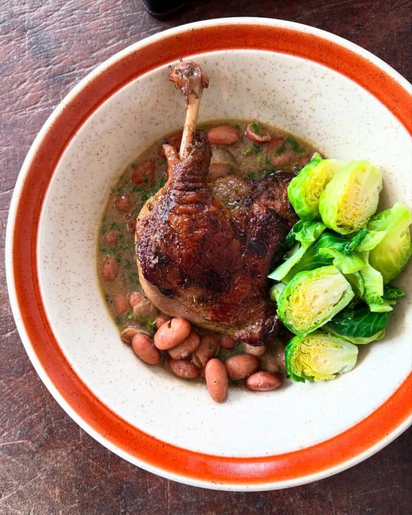 Slow Braised Duck Legs With Garlic And Herbs