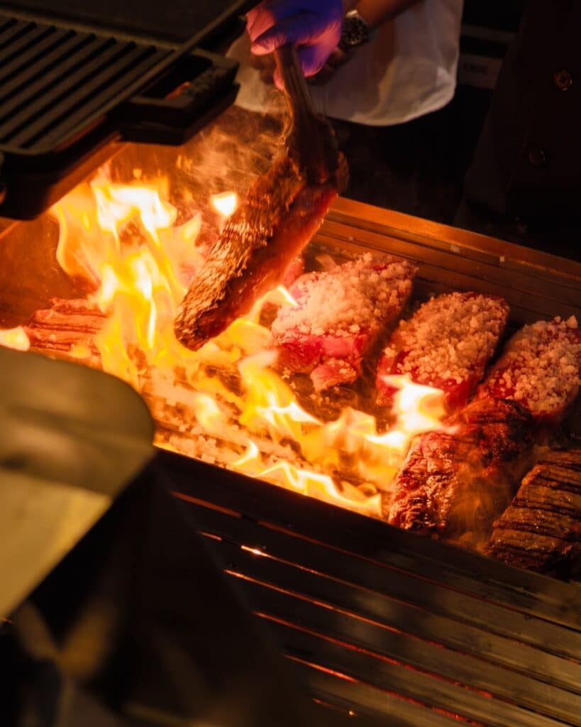 Spanish Bbq Traditions: From Chorizo To Fire-Roasted Seafood 5 Grilling Meat With Flame Outs