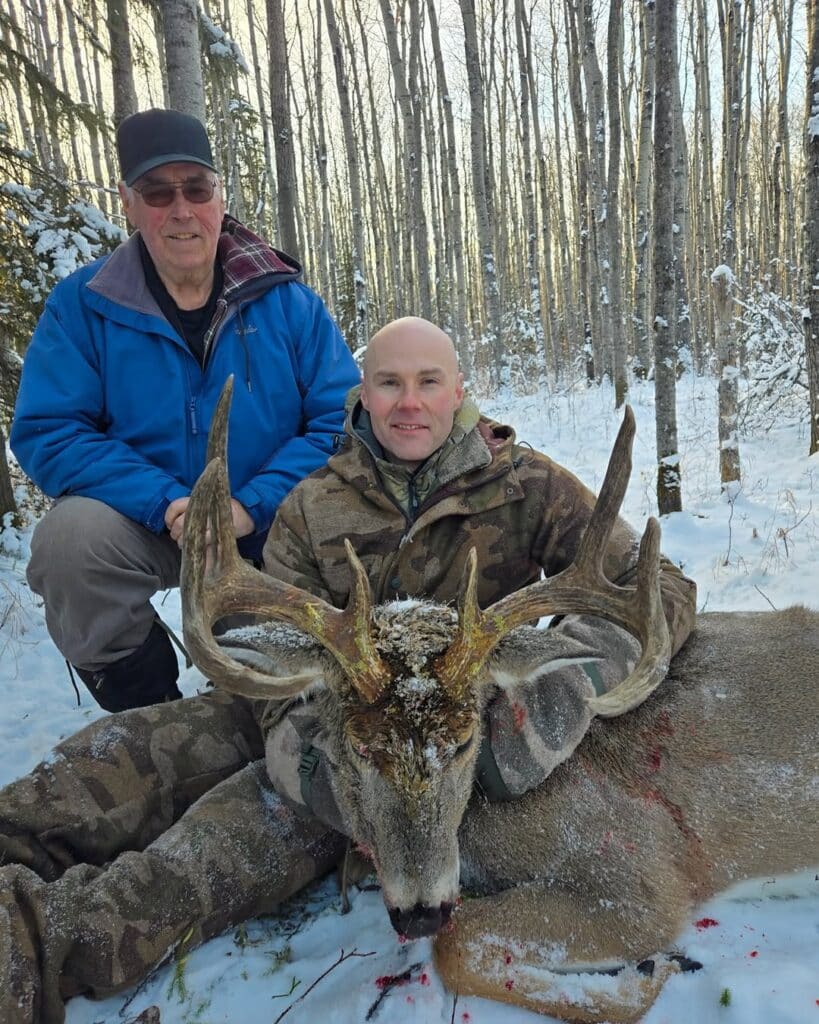 Best Practices For Grilling Venison, Elk, And Other Game Meat 2 Hunters Posing For A Photo With Their Catch