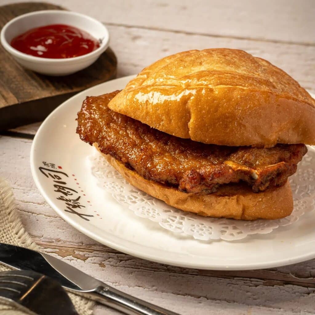 Macanese Street Food 101: Pork Chop Bun 1 Meaty And Delicious Pork Chop Bun From Macau