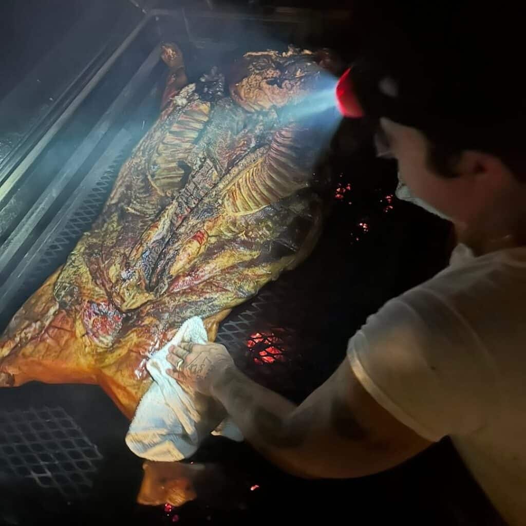 Pitmaster Prepping The Whole Pig For The Event