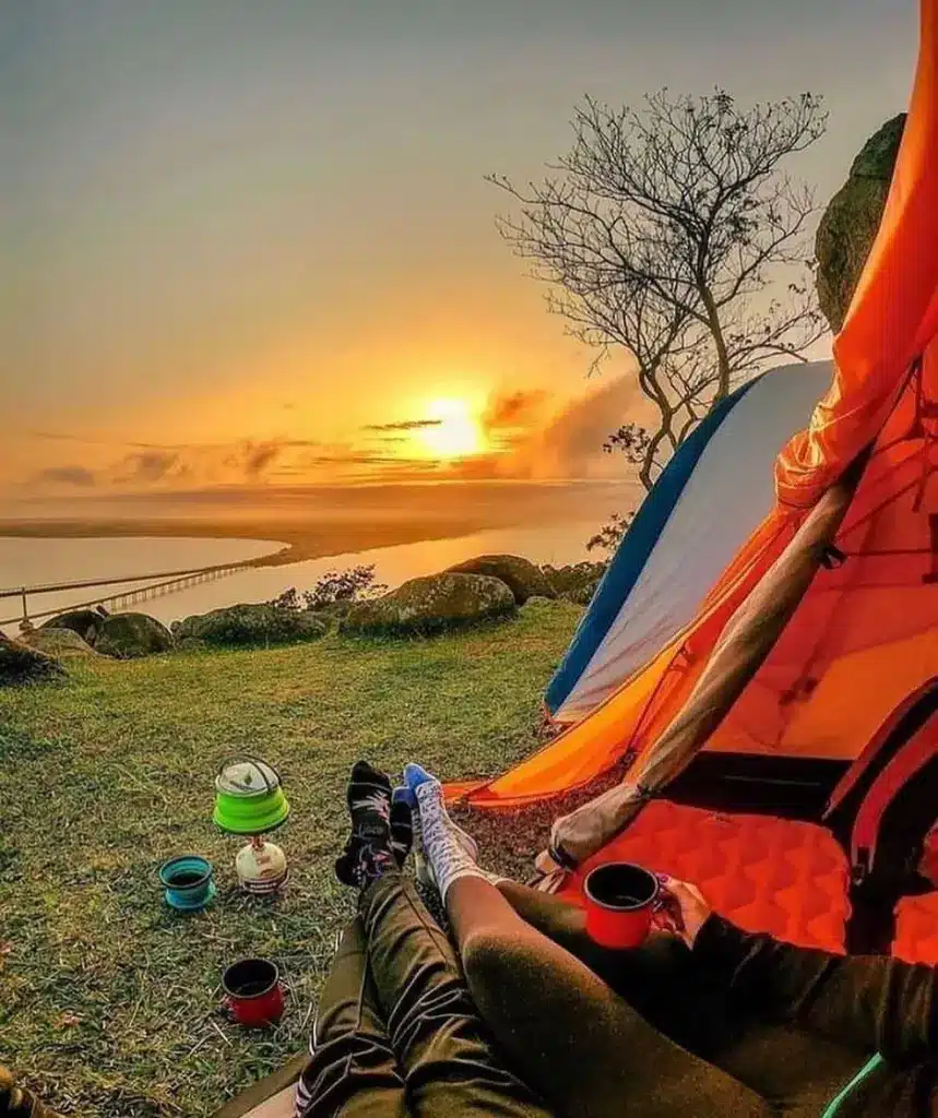 Watching Sunrise During Camping