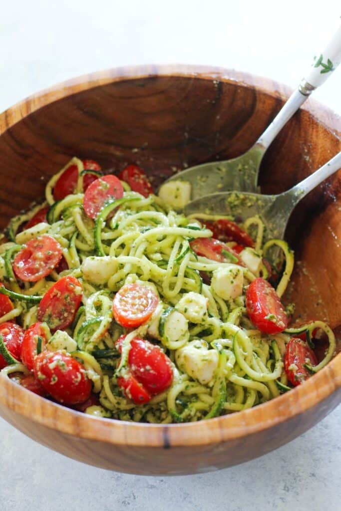Zucchini Noodles With Pesto And Cherry Tomatoes