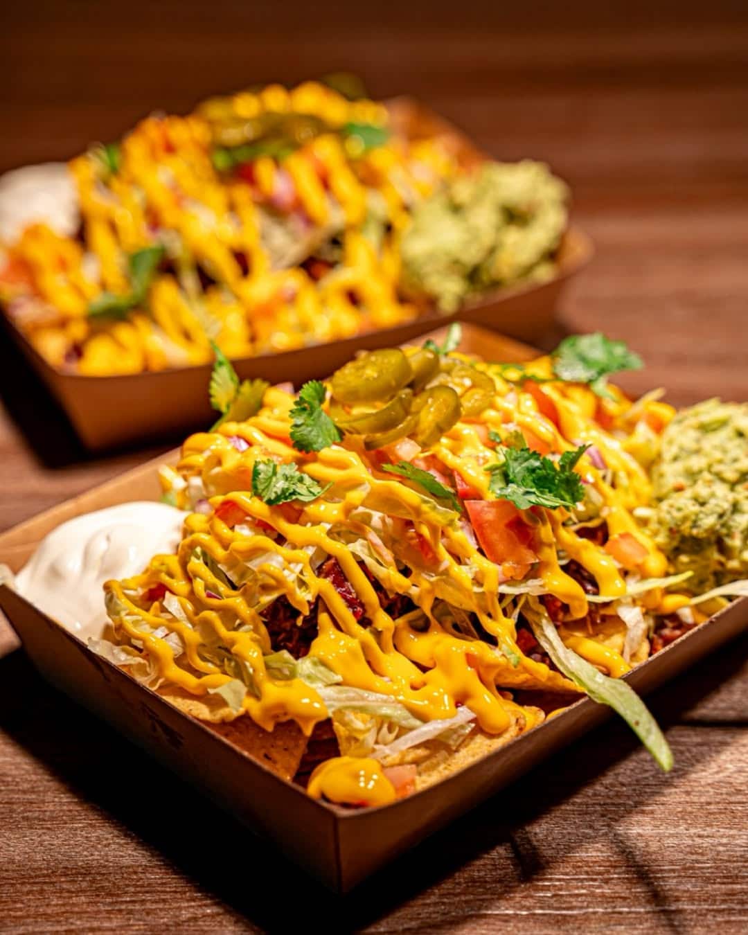 loaded bbq nachos with smoked brisket and jalapenos