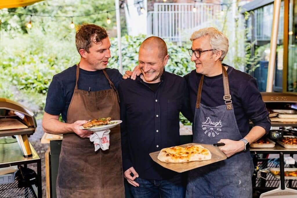 Crust Goals: Level Up Your Pizza Game With These 10 Best Ooni Pizza Grills 13 Men Being Satisfied With Their Pizzas