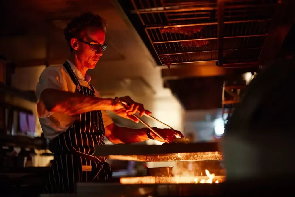 A Pitmaster In The Grill Pit