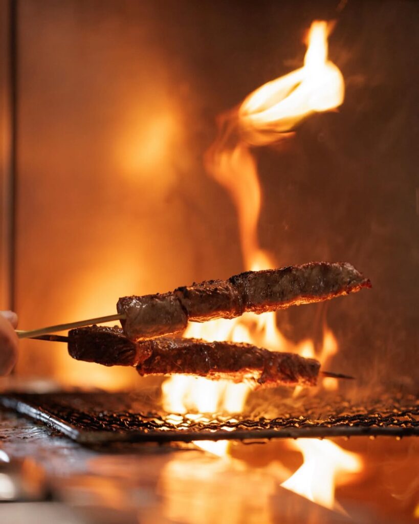 Bbq Skewers On The Grill With Flames