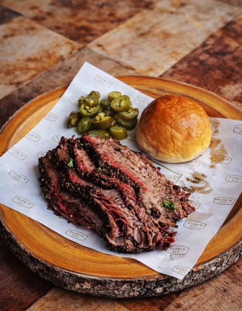 Low And Slow Smoked Pulled Pork With Bread And Olives