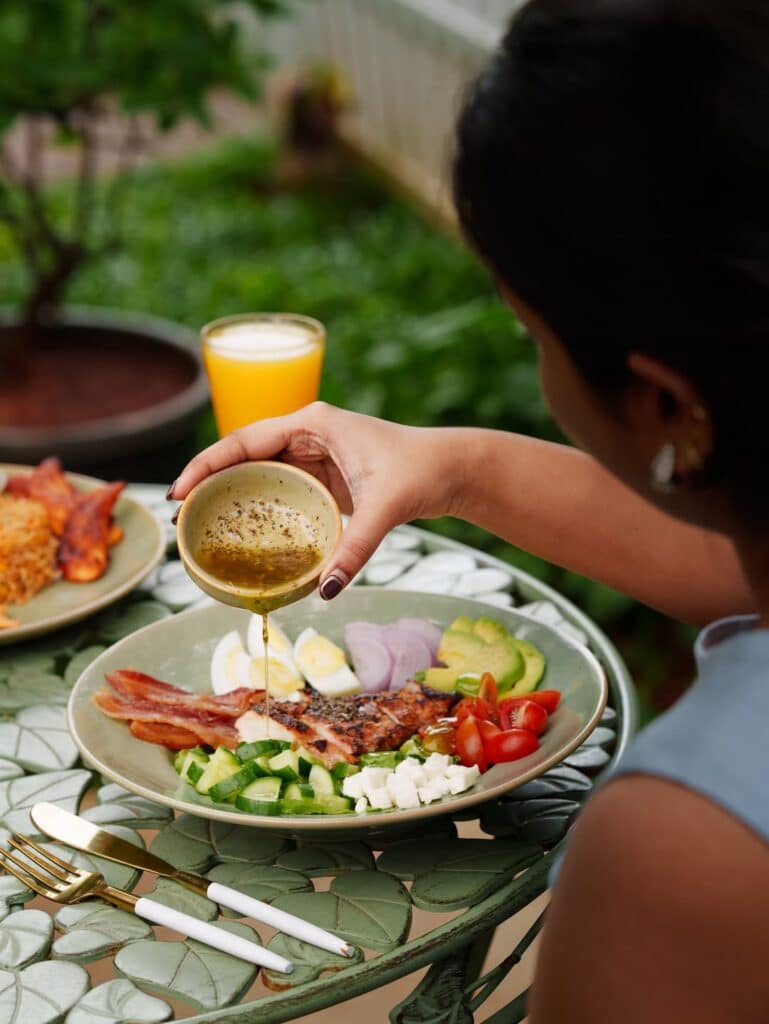 Woman Eating A Perfect Cobb Salad