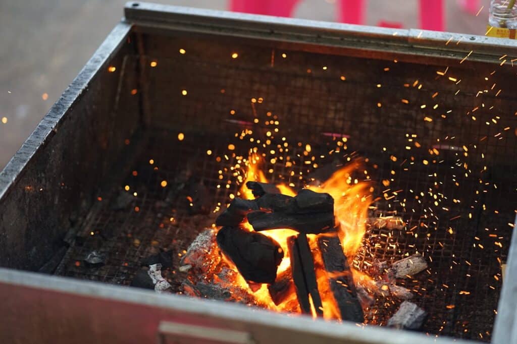 Charcoal Grill With Charcoal Briquettes