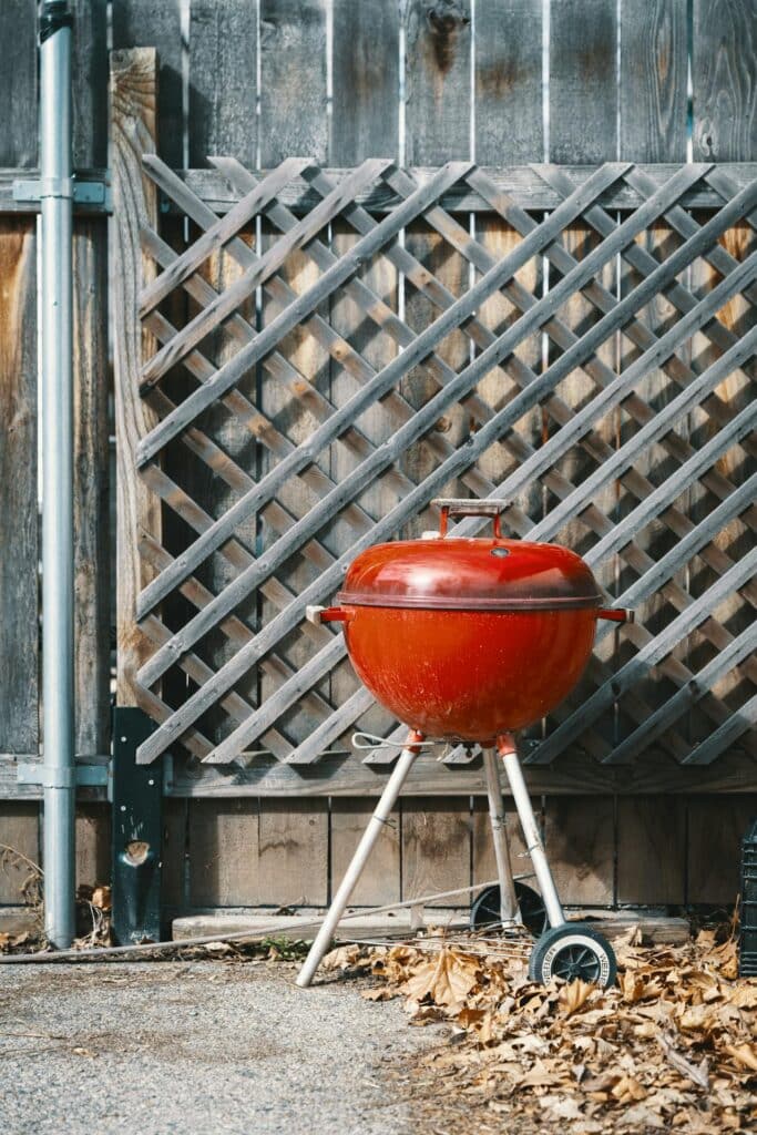 Orange Charcoal Grill Left Outside