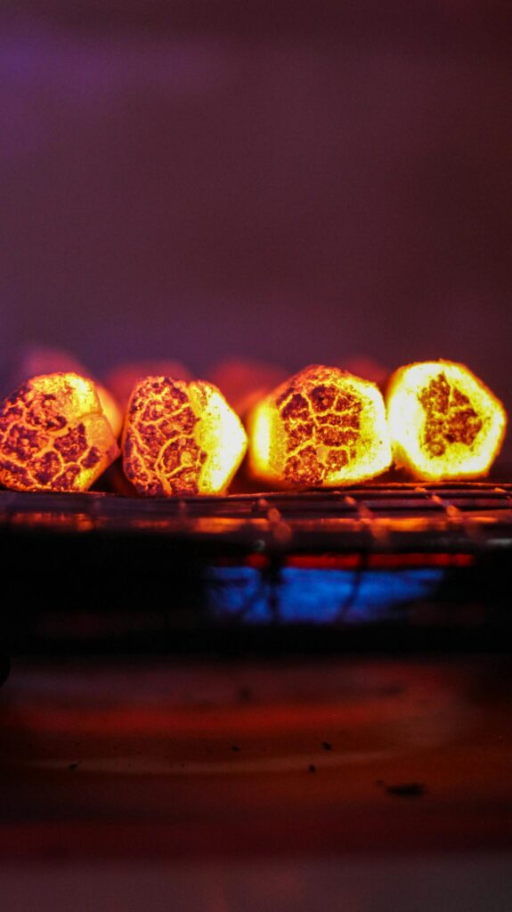 Why Charcoal Still Beats Gas For Flavor 5 Smoldering Charcoal Briquettes