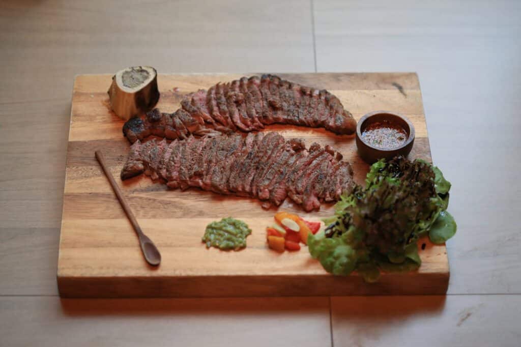Tri-Tip Steak On A Wooden Board