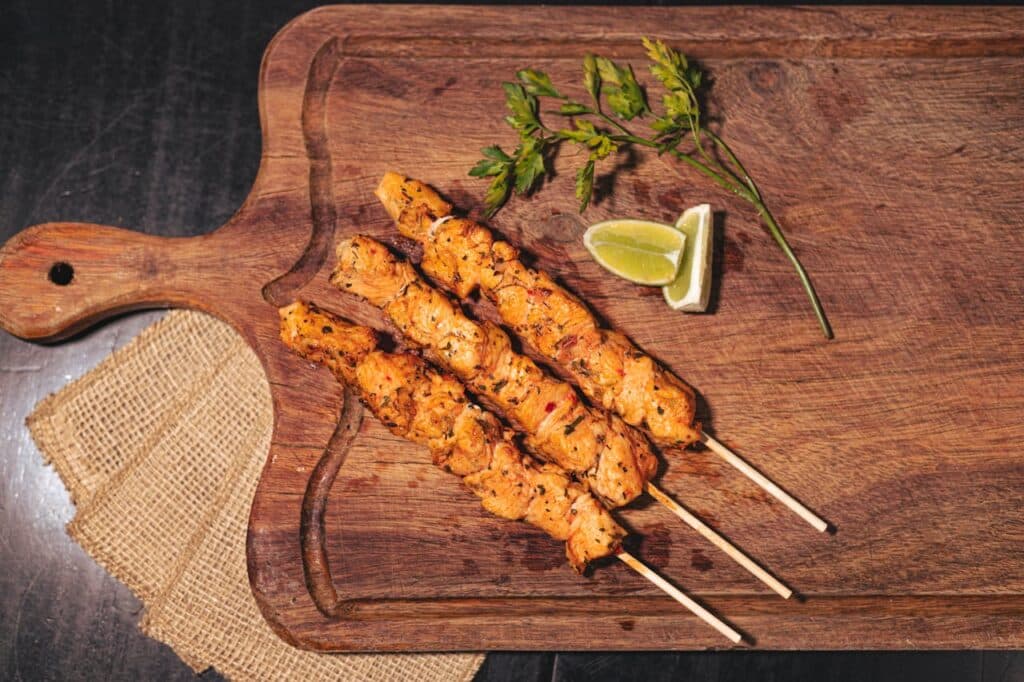 Al Pastor Style Chicken Skewers On The Chopping Board