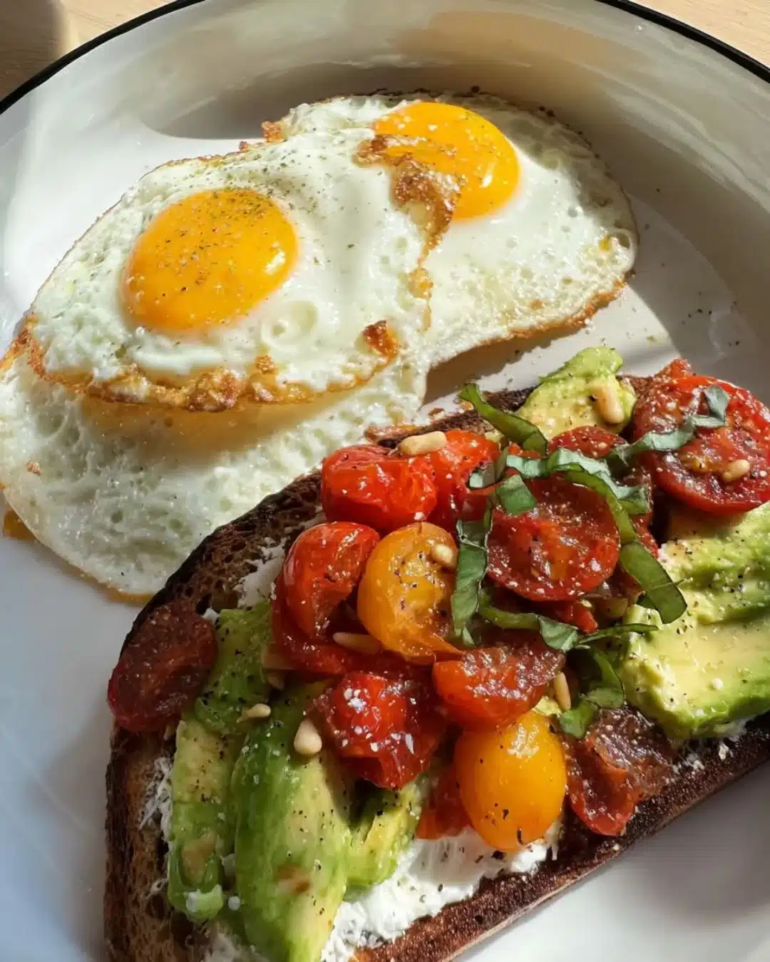 avocado ricotta toast with poached eggs