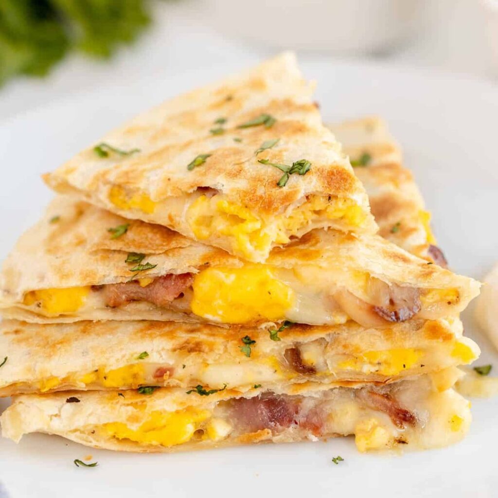 10 Cheesy, Crispy, &Amp; Comforting Breakfast Entree Recipes 2 Cheesy Bacon Breakfast Quesadilla