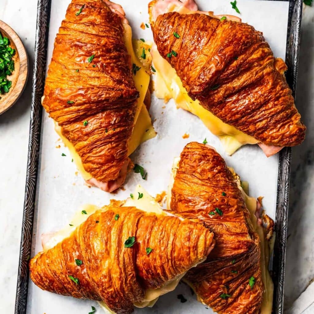 10 Cheesy, Crispy, &Amp; Comforting Breakfast Entree Recipes 5 Crispy Ham And Swiss Breakfast Croissant Bake