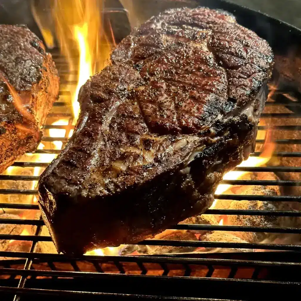 Huge Beef Steak Over A Charcoal Grill