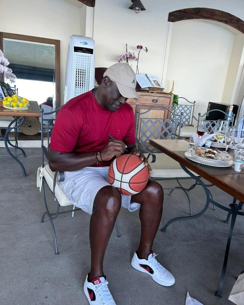 Jordan Signing A Basketball For His Fans