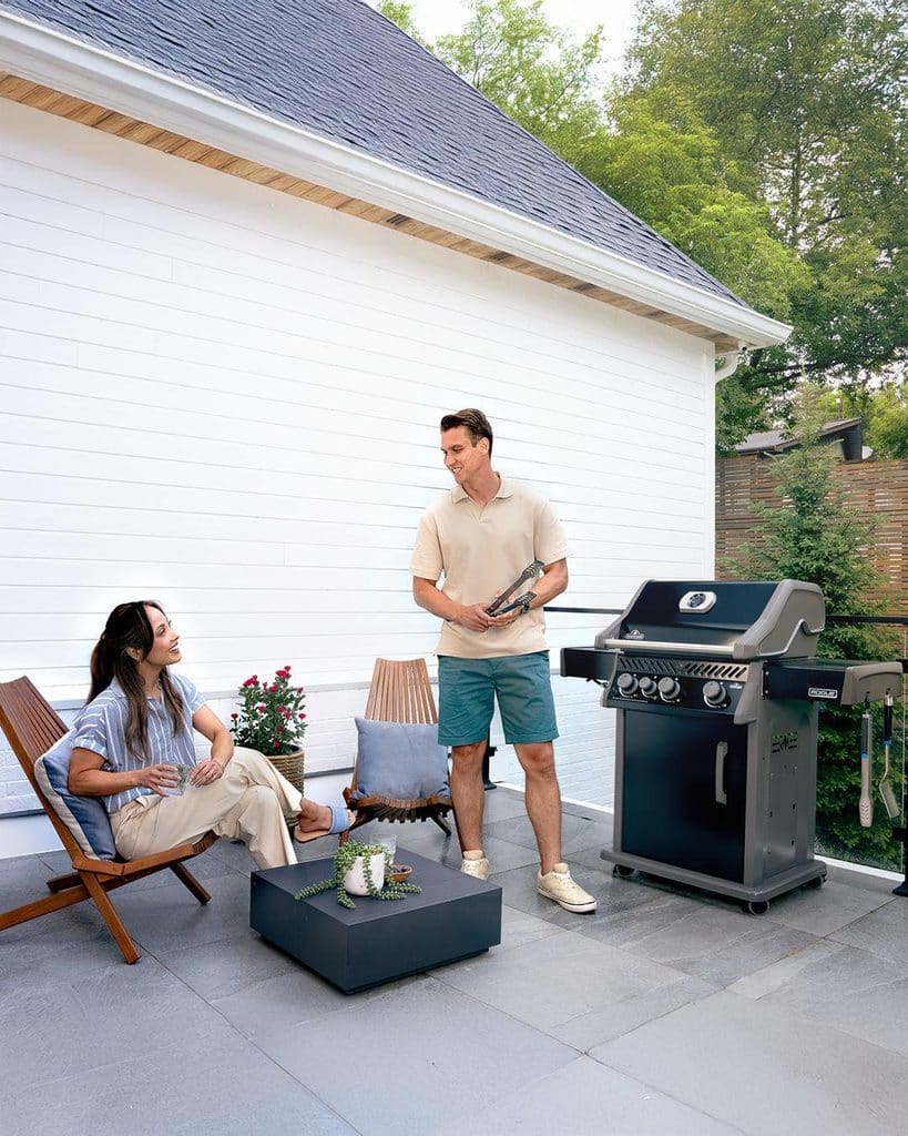 A Couple Cooking With The Napoleon Rogue Grill