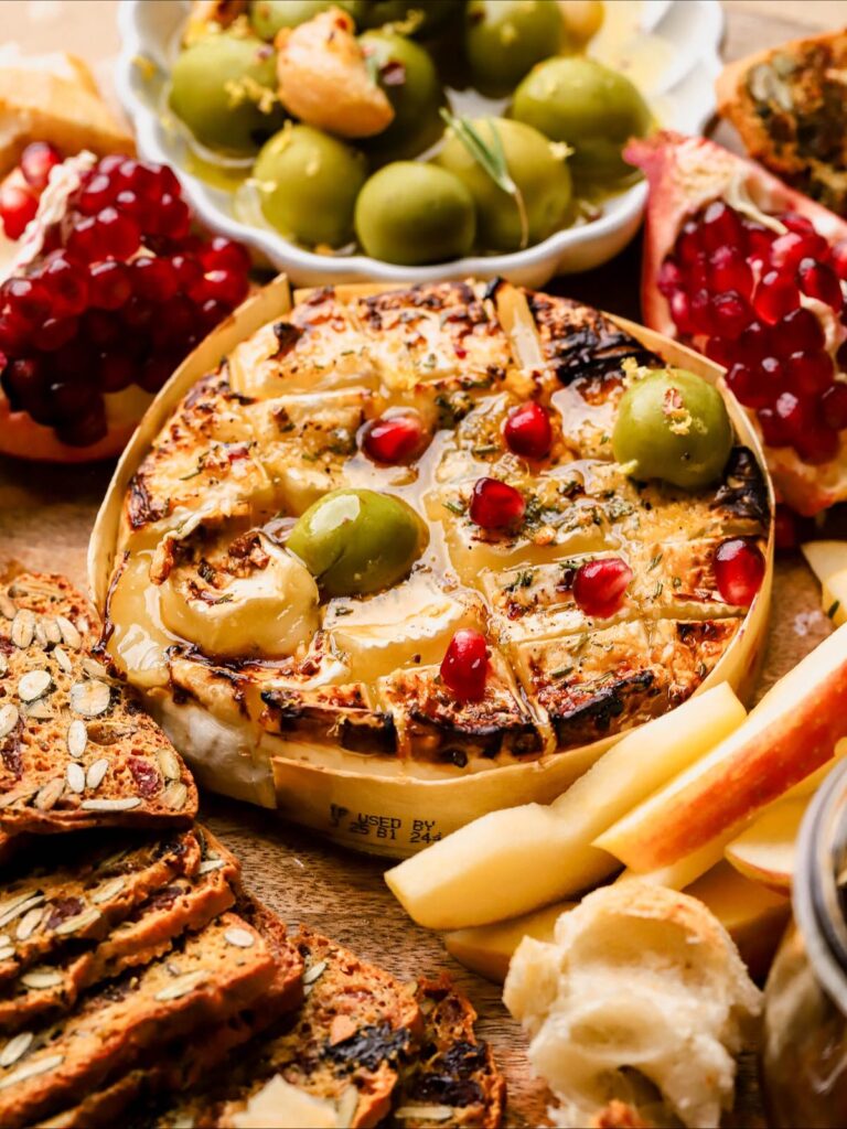 12 Next-Level Brie Cheese Recipes That Are Almost Too Pretty To Eat 4 Baked Brie With Garlic And Rosemary
