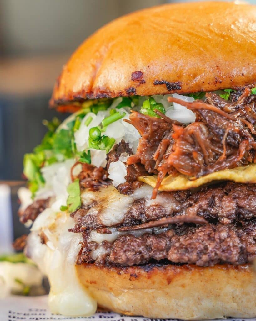 Birria Burger With Oozing Sauce