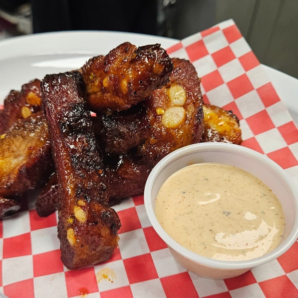 A Platter Of Ribs And Alabama White Sauce