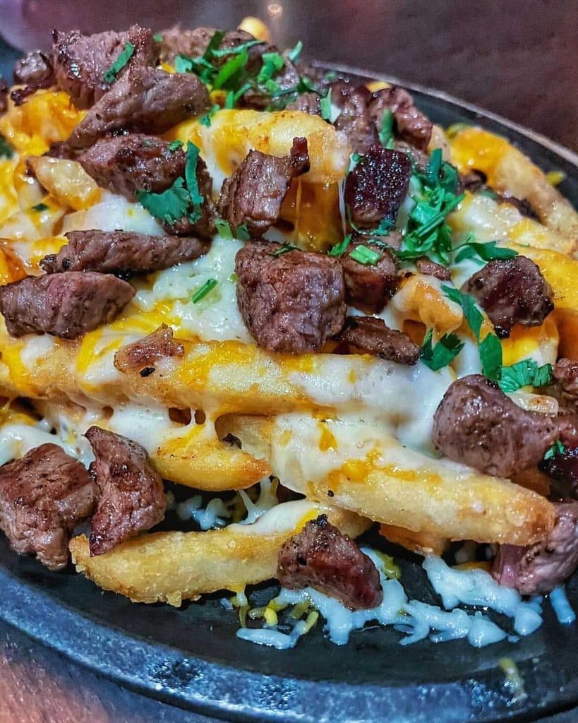 Warning: These Carne Asada Fries Disappear Fast 1 Carne Asada Fries On A Tiny Platter
